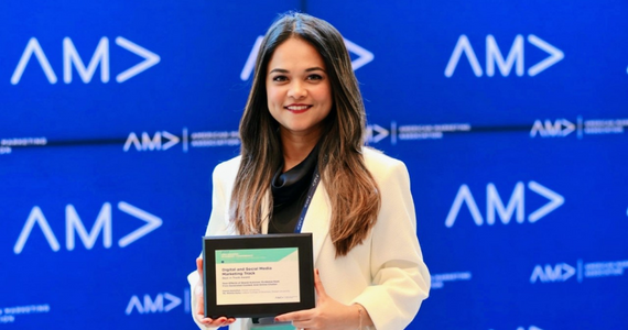 An image of Mithila Guham winner, of "Best Track Paper" at the Summer American Marketing Associating Conference.